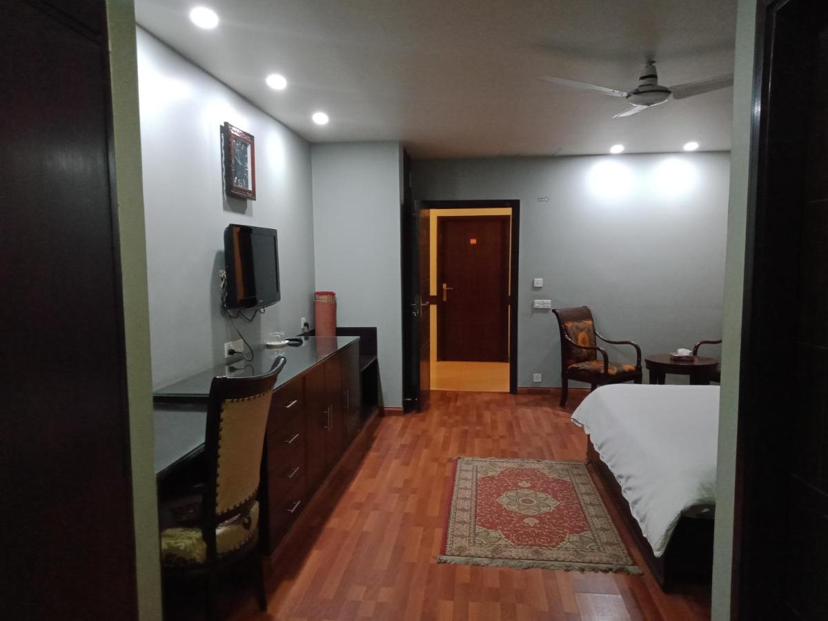 Hira Guest House Karachi Buitenkant foto
